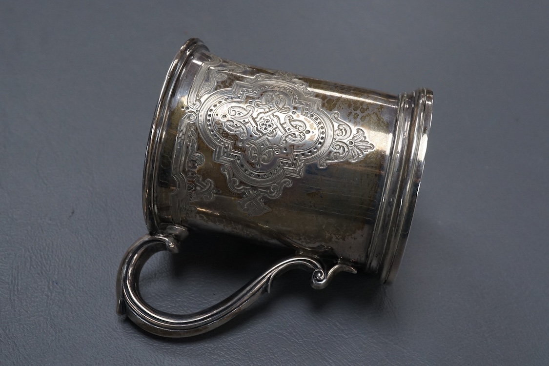 A Victorian engraved silver christening mug, Edward Ker Reid, London, 1871, height 85mm, 133 grams.